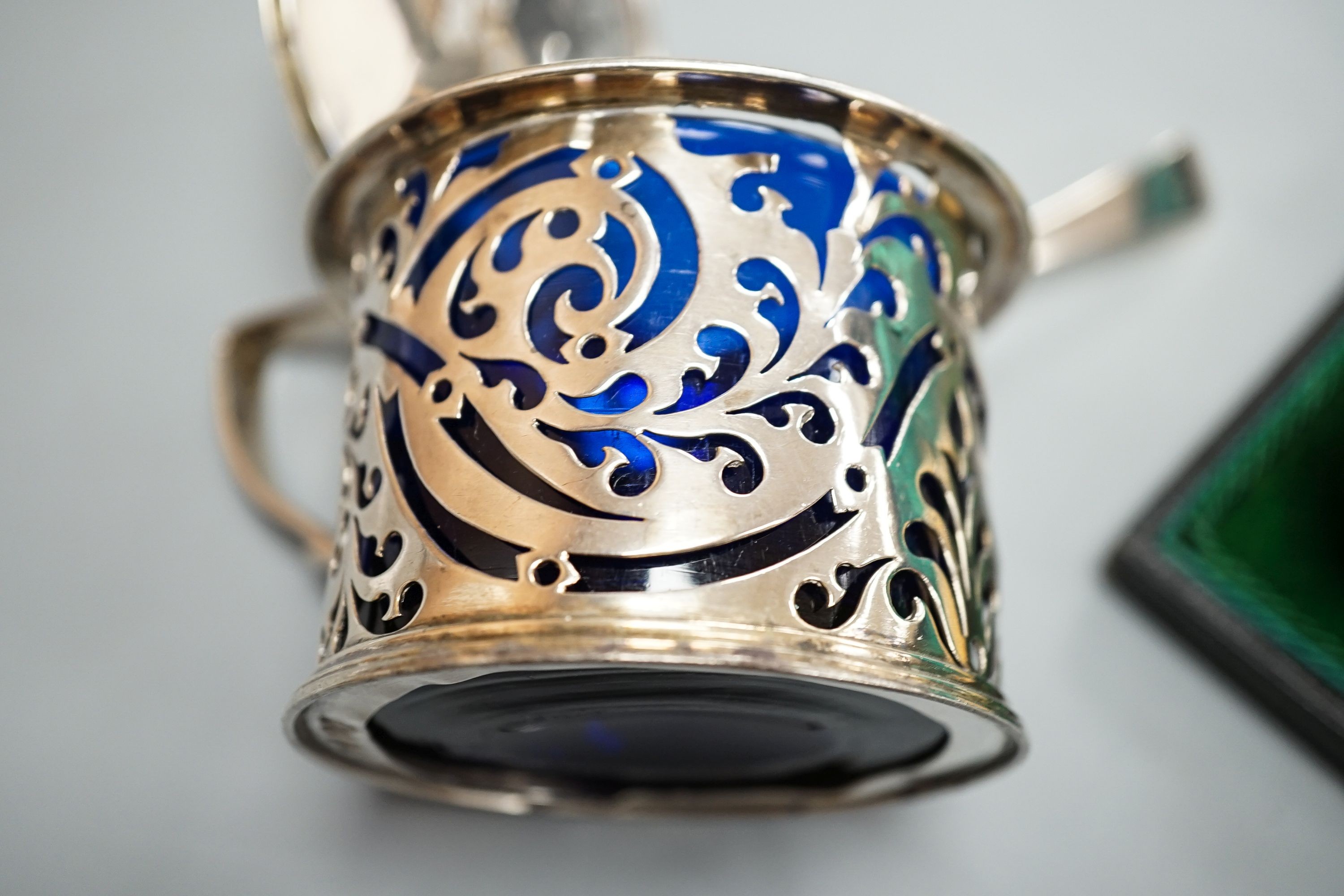A Victorian pierced silver drum mustard, London, 1839 and a cased pair of silver salts with spoons.